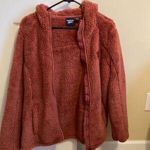 Ladies Medium Reebok fleece jacket. Great condition. Rust color